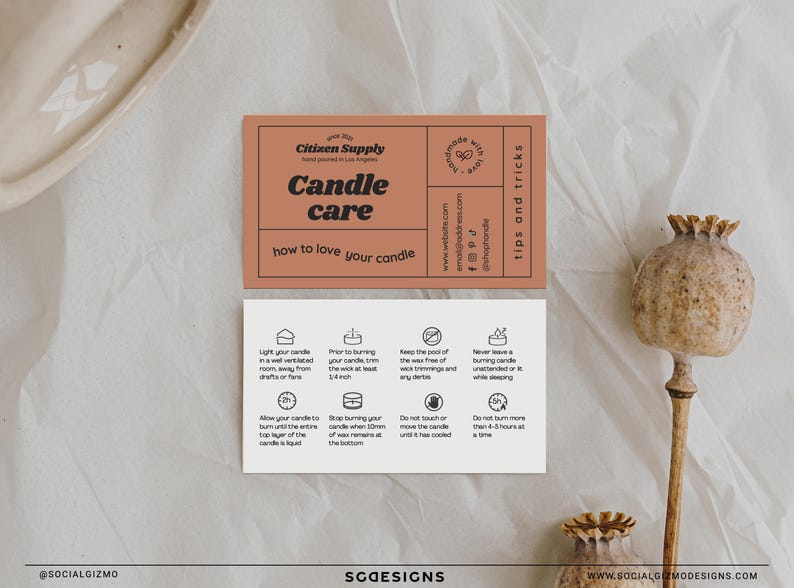 Candle care card template mockup displayed beside botanical styling elements, featuring editable retro packaging insert cards for candle businesses.