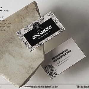 May include: Two business cards with a black and white floral design. The top card says "sweet essences scented candles" and the bottom card says "creating unforgettable memories through scents".