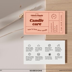 Candle care card template mockup displayed beside botanical styling elements, featuring editable retro packaging insert cards for candle businesses.