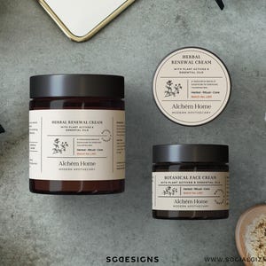 May include: A flat lay of Alchém Home skincare products. The image shows three jars of cream, a bottle with a pump, a round container, a brush, and a white sponge. The jars have black lids and beige labels with text and botanical illustrations.