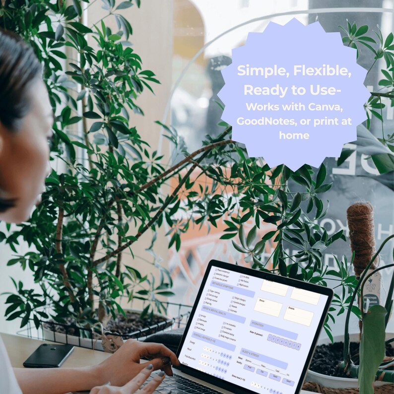 May include: A laptop screen displays a digital form, with text reading "Simple, Flexible, Ready to Use - Works with Canva, GoodNotes, or print at home." The laptop is on a desk, surrounded by green plants. The form has various fields and sections.