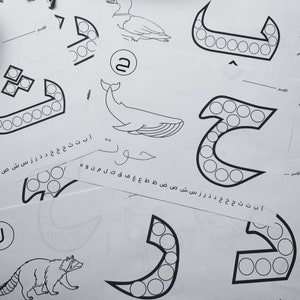 May include: A black and white worksheet featuring Arabic letters and numbers. The letters are outlined with circles and the numbers are written in the centre of the circles. The worksheet is designed for children to practise writing Arabic letters and numbers.