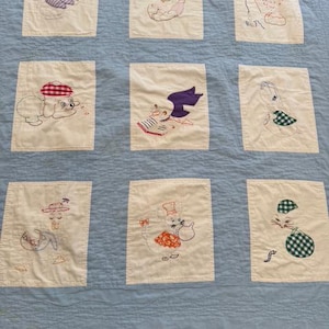 40.5”L x 44”W Vintage  Blue Baby Quilt with Embroidered Novelty Animals