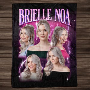 May include: Black fleece blanket featuring the name "Brielle Noa" in pink text. The blanket has a retro design with multiple images of a woman with blonde hair, set against a purple and pink background with lightning bolts.