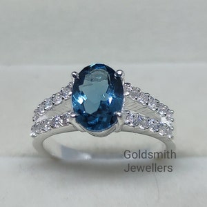 London Blue Topaz Ring: 925 Sterling Silver, CZ Accents