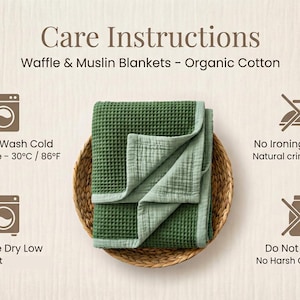 May include: A green waffle and muslin blanket made of organic cotton, folded in a woven basket. The blanket has a textured waffle weave on one side and a smooth muslin on the other. Care instructions include machine wash cold at 86&deg;F.