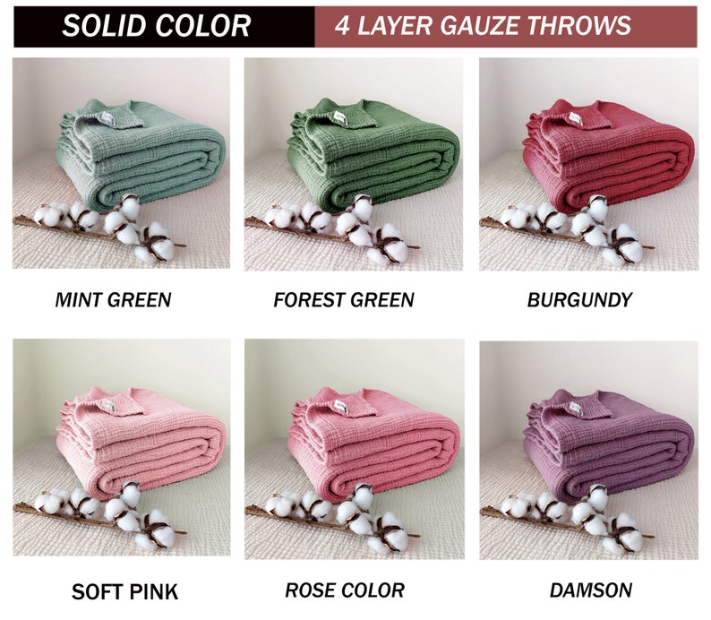 May include: Six folded gauze throws in different colours: mint green, forest green, burgundy, soft pink, rose colour, and damson. The throws are arranged in two rows of three, with a white cotton branch in front of each throw.