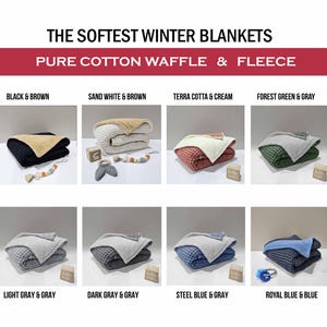 May include: An image displaying a range of winter blankets in different colour combinations. The blankets are shown in black and brown, sand white and brown, terra cotta and cream, forest green and grey, light grey and grey, dark grey and grey, steel blue and grey, and royal blue and blue. The text reads "THE SOFTEST WINTER BLANKETS" and "PURE COTTON WAFFLE & FLEECE."