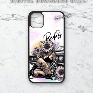 May include: A black phone case with a white background and a colorful watercolor design. The design features a woman with tattoos sitting on a car with sunflowers and the word "Badass" with a heart.