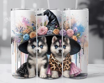 May include: Two adorable husky puppies wearing a witch hat with flowers and a pink and black dress. The background is a watercolor design with colorful drips.