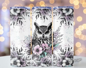 May include: Three stainless steel tumblers with a white background and a black and white illustration of an owl with pink and purple flowers. The tumblers are a great way to keep your drinks cold or hot.