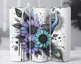 May include: A white stainless steel tumbler with a design featuring a peacock with blue and green feathers, purple and blue sunflowers, and black and white mandala-like patterns. The tumbler has the text "SNK designs" at the bottom.