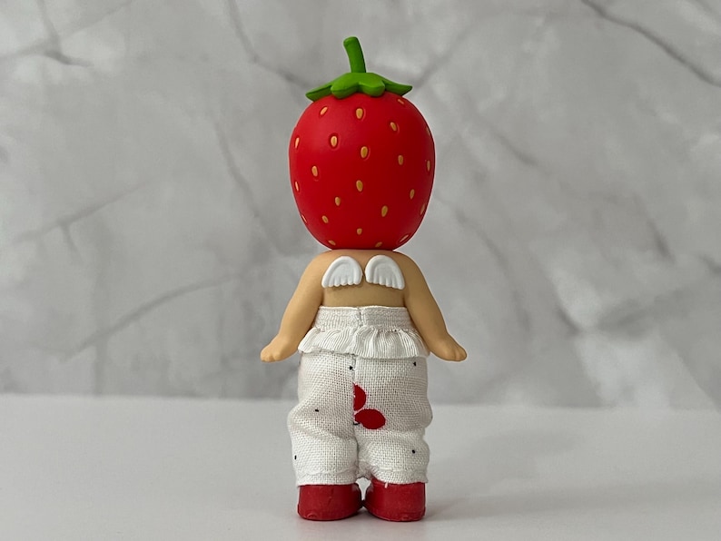 May include: A set of three ceramic mugs with a speckled, matte finish. The mugs are in shades of cream, light gray, and dark gray. Each mug has a simple, modern design and a rounded handle. Perfect for coffee or tea.