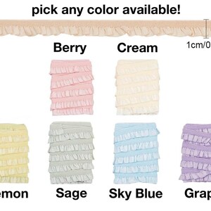 K&ouml;nnte beinhalten: Ger&uuml;schtes Zierband in verschiedenen Farben: Beere, Creme, Zitrone, Salbei, Himmelblau und Traube. Das Band ist etwa 1 cm breit. Der Text oben lautet "W&auml;hlen Sie eine beliebige Farbe!"