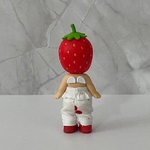 May include: A rustic wooden sign with the text "Welcome to our home" in white lettering. The sign features a distressed finish and a simple, inviting design, perfect for entryway decor.