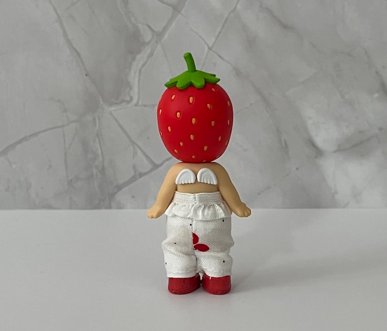 May include: A rustic wooden sign with the text "Welcome to our home" in white lettering. The sign features a distressed finish and a simple, inviting design, perfect for entryway decor.