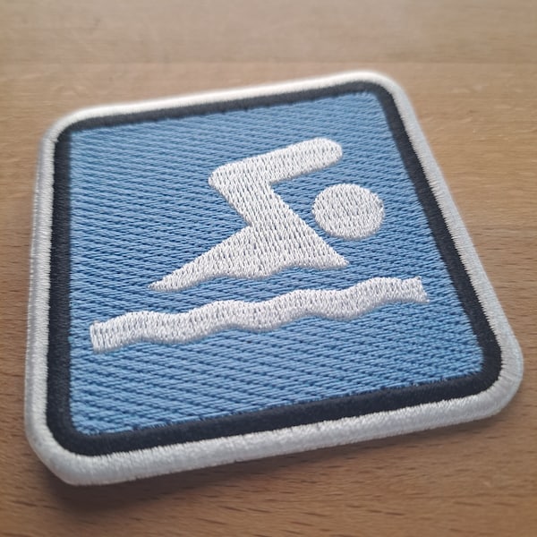 Swimming iron on patch for backpack, jacket or vest