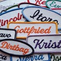 Personalized Embroidered Iron-On Name Patch for Clothing, Luggage, Uniforms, and Pet Accessories product logo