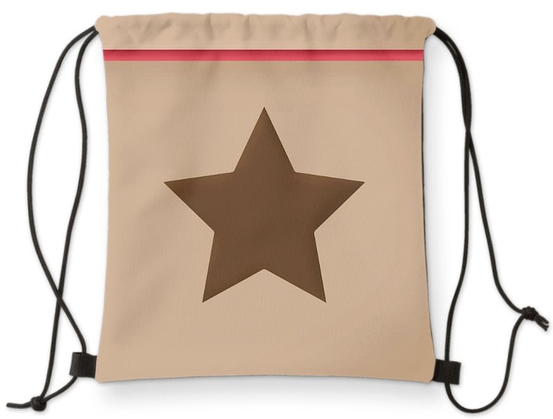 May include: A beige drawstring bag with a brown star in the center. The bag has a red stripe across the top.