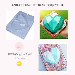 May include: A three-piece silicone mold for making a large geometric heart-shaped cake. The mold is light blue and the cake is shown in two different colors, teal and light blue. The cake is decorated with sprinkles and the words "Eiglita" are written on the cake.