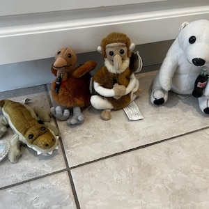 international coca-cola bean bag Plush collection includes: Neppy, Kelp the Kiwi, Crunch the Crocodile and the original Polar Bear. Retired