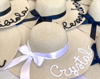 Straw hats with names and ribbons for hen parties