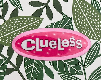 May include: White background with a green leafy pattern. A pink oval sticker with the word "ClueLess" in white letters.