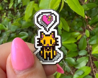 Pin de esmalte duro de gato naranja inspirado en Stardew