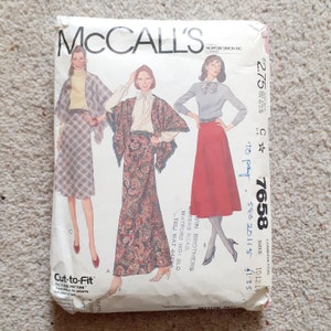 May include: A vintage McCall's sewing pattern envelope showing illustrations of three skirt and top outfits. The envelope is white with text and illustrations in various colours. The pattern number is 7658. Measurements are in inches.
