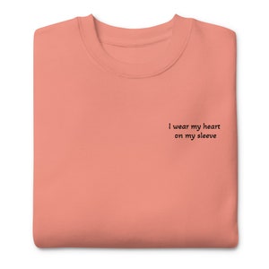 Unisex sweatshirt | I wear my heart on my sleeve | baby | First time mom | Mother’s Day gift | gift for mom | love |