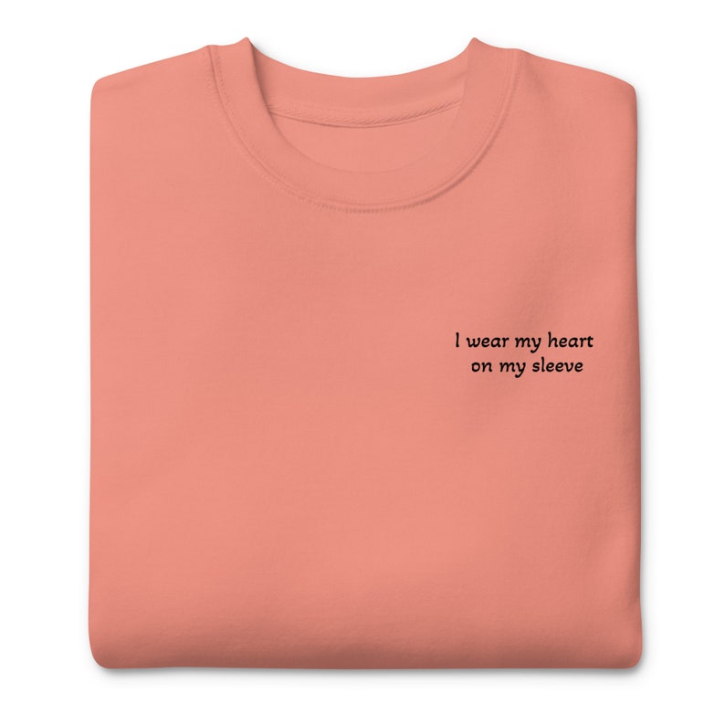Unisex sweatshirt | I wear my heart on my sleeve | baby | First time mom | Mother’s Day gift | gift for mom | love |