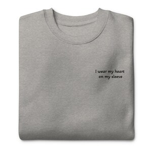 Unisex sweatshirt | I wear my heart on my sleeve | baby | First time mom | Mother’s Day gift | gift for mom | love |