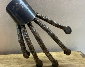 Contemporary sculpture "The Hand of the Heart", signed, metal and bronze