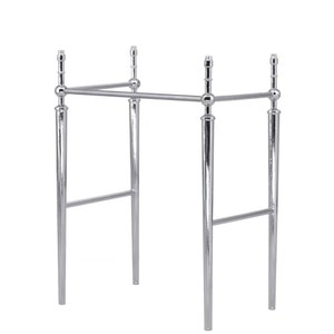 May include: A polished chrome vanity base with four vertical supports connected by horizontal bars. The supports have a tapered design and decorative ball accents. The base is designed to support a sink.