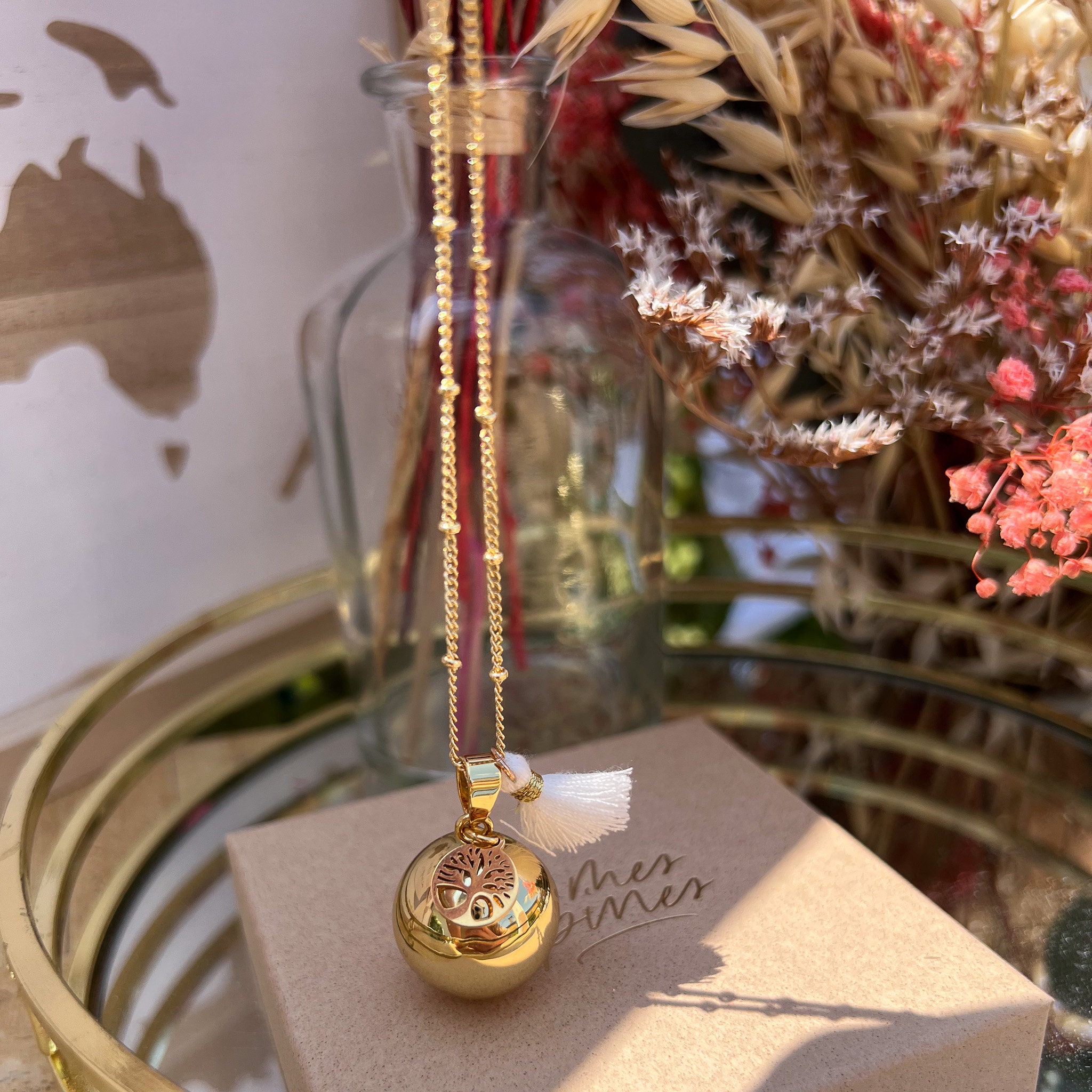 Gold harmony ball best sale necklace