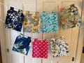 Lined clothespin bag with heavy duty snaps for secure hanging, holds approx 75 clothespins (not included). Click for fabric options.