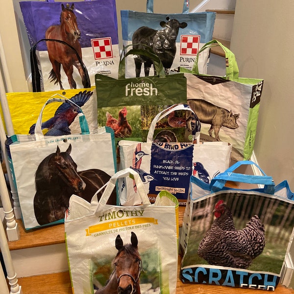 Repurposed Feed bags with inside pocket and snap closure.Endless possibilities for these durable bags!Click for size / pet options.