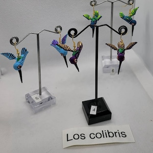 This beautiful earrings are called  Alebrijes they are brightly colored Oaxacan-Mexican folk art sculpture of fantastical creatures