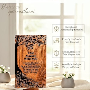 May include: A wooden memorial plaque with the text "I AM ALWAYS WITH YOU" and a tree design. The plaque is made of fine rosewood and includes a poem. The image also features small decorative flower pots.