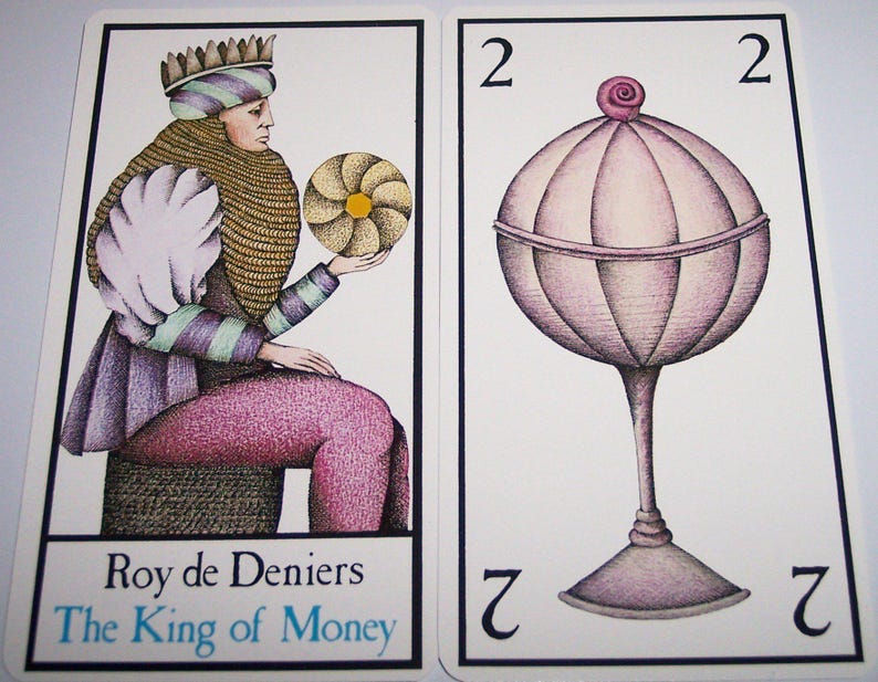May include: Two tarot cards. The first card shows a figure in purple and green attire, holding a golden disc. The text at the bottom reads "Roy de Deniers" and "The King of Money". The second card depicts a stylized goblet with a pink, orb-like top and the number "2" at the top and bottom.
