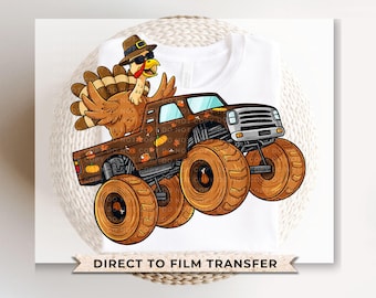 May include: A brown monster truck with a Thanksgiving turkey driving it. The truck has autumn-themed decorations and large tyres. The turkey is wearing a pilgrim hat and sunglasses. The text "Direct to Film Transfer" is at the bottom of the image.
