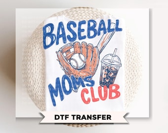 May include: White t-shirt featuring a baseball glove, ball, and a drink with ice. The words "BASEBALL MOMS CLUB" are in blue and red. The image includes the text "DTF TRANSFER".