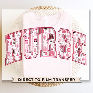 May include: Pink and white Christmas themed iron-on transfer design that says "NURSE" in a bold, blocky font.  Direct to film transfer.