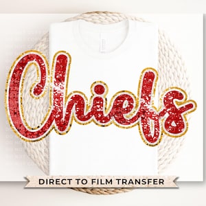 May include: Red and gold glitter iron-on transfer with the word "Chiefs" in a cursive font.  Direct to film transfer.