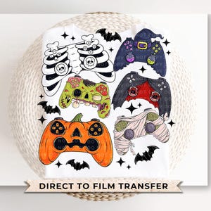 May include: A set of six Halloween-themed iron-on transfers featuring video game controllers with spooky designs. The designs include a skeleton, a zombie, a pumpkin, a mummy, a witch, and a skull. The transfers are perfect for adding a fun and festive touch to your Halloween crafts.