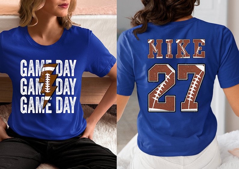 May include: Two blue t-shirts with a football theme. One shirt says "GAME DAY" three times with a lightning bolt graphic. The other shirt says "MIKE" and "27" with a football graphic.