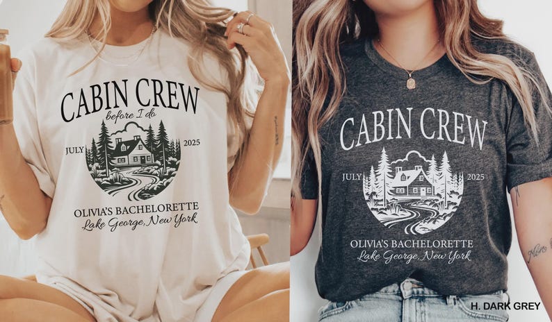 May include: A cream t-shirt and a dark grey t-shirt, each featuring a graphic of a cabin in the woods with the text "CABIN CREW before I do", "JULY 2025", "OLIVIA'S BACHELORETTE", and "Lake George, New York" printed in a circular design.