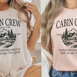 May include: A cream and a peach t-shirt featuring black text that reads CABIN CREW before I do, July 2025, OLIVIA'S BACHELORETTE, Lake George, New York. The graphic includes a circular illustration of a cabin surrounded by pine trees and a path.