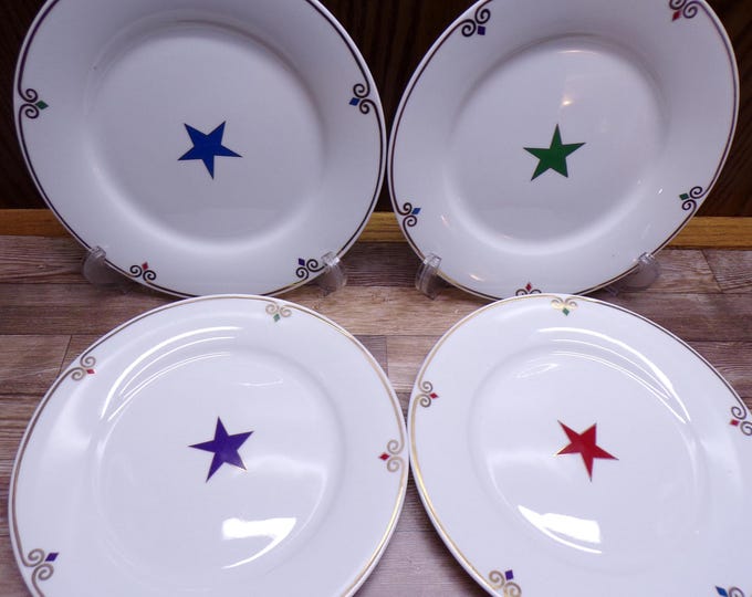2511 Pier 1 Imports Celebration 7.5" Dessert / Snack Plates Set of 4 Red, Green, Blue, Purple Stars - Great Condition