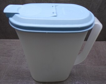 2603 Tupperware Slimline 2 qt. Juice Pitcher 5.5" x 3" x 9" Tall Frosted Clear w/ Blue Lid - Great Condition